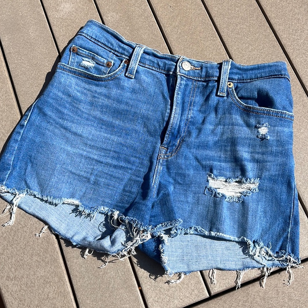 Levi’s high rise denim jean shorts, distressed size 35 pocket cutoffs